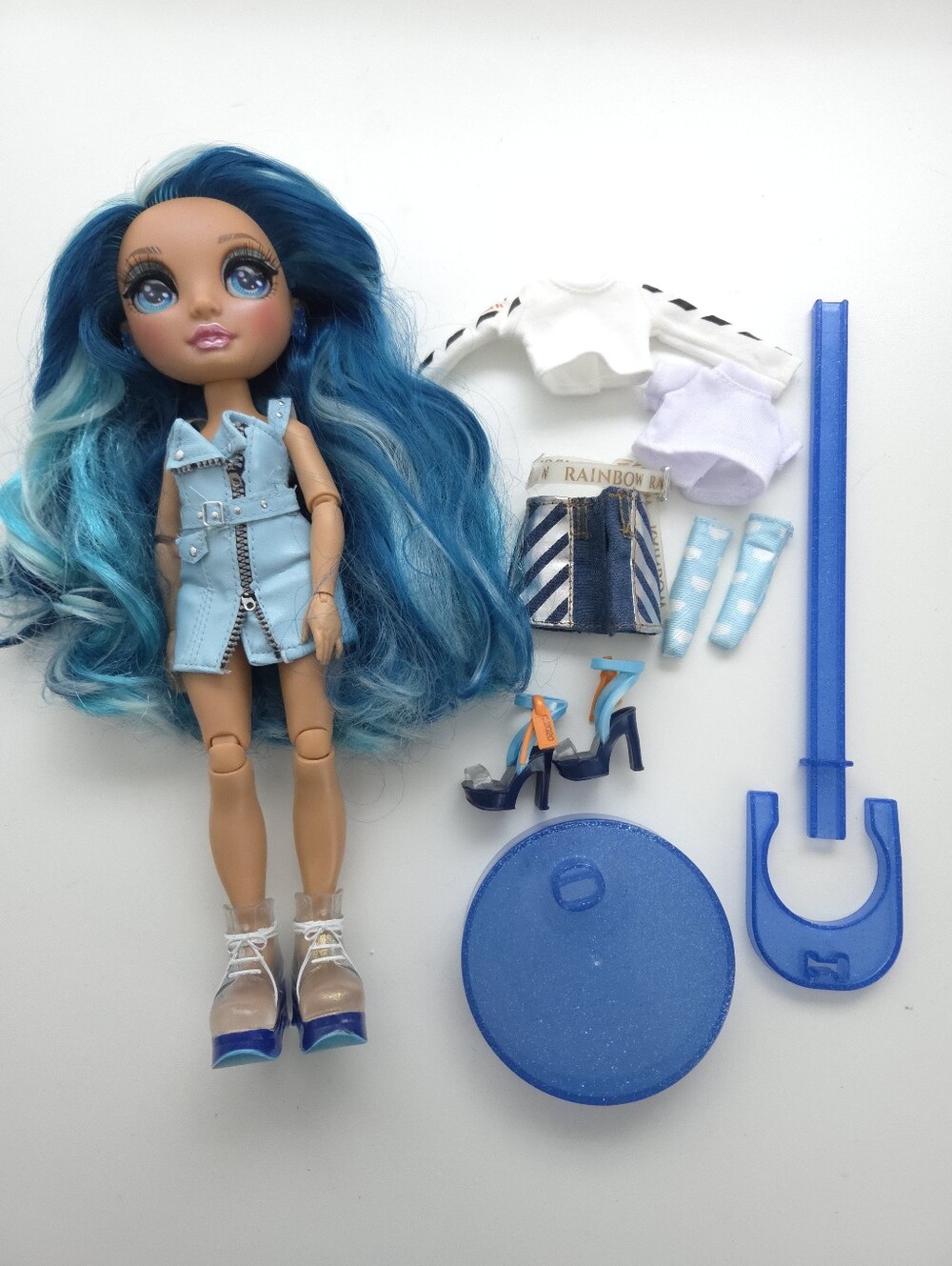 Rainbow High Skyler Bradshaw Blue Fashion Doll with Extra Outfit and Stand